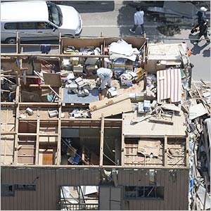 Kyodo News/AP